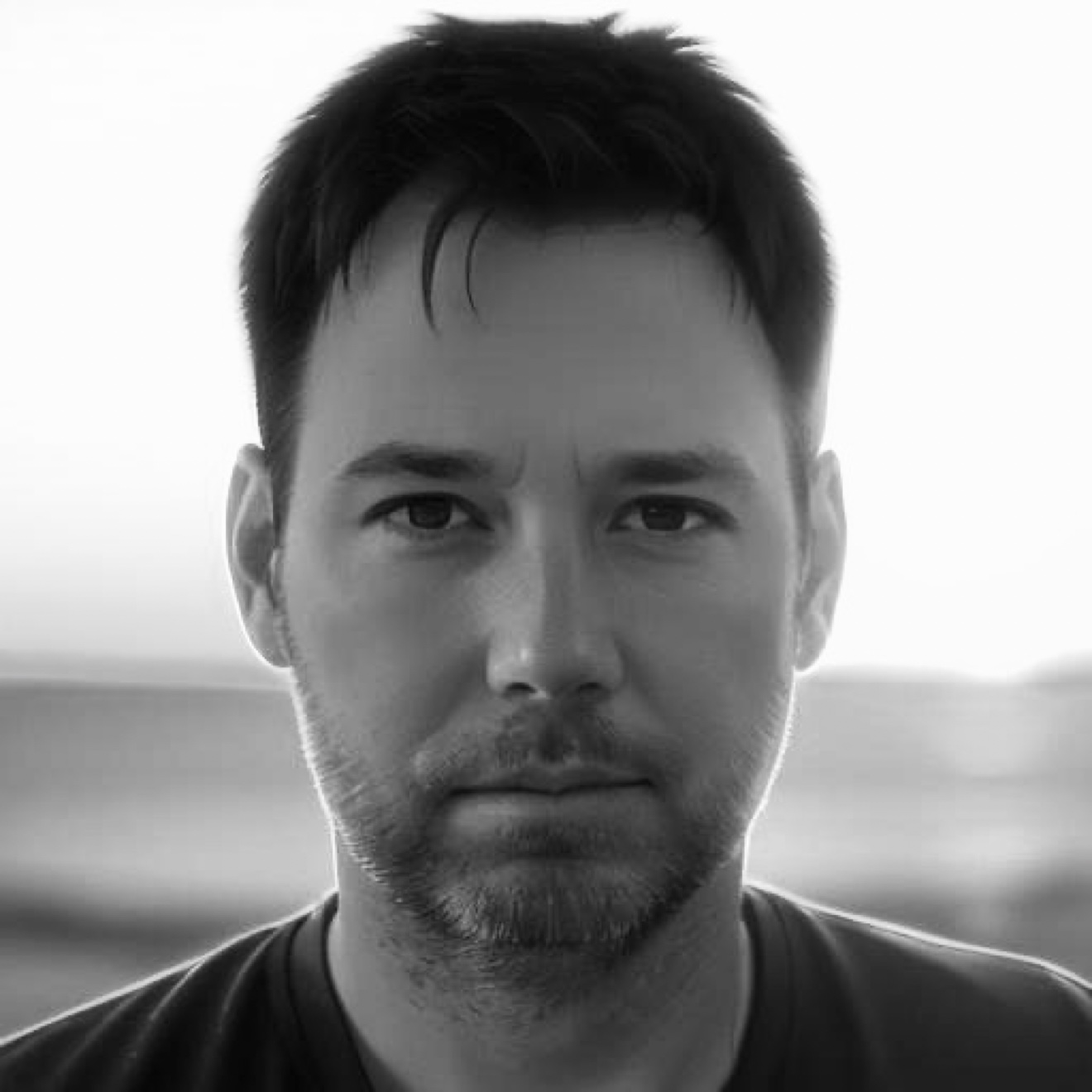 Black-and-white headshot of singer-songwriter Franklin McKay
